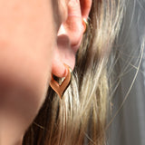 Forcella yellow gold plated wishbone hoop earring