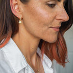 Cascara pair of gold huggie hoop earrings with detachable shell charm - Helix & Conch