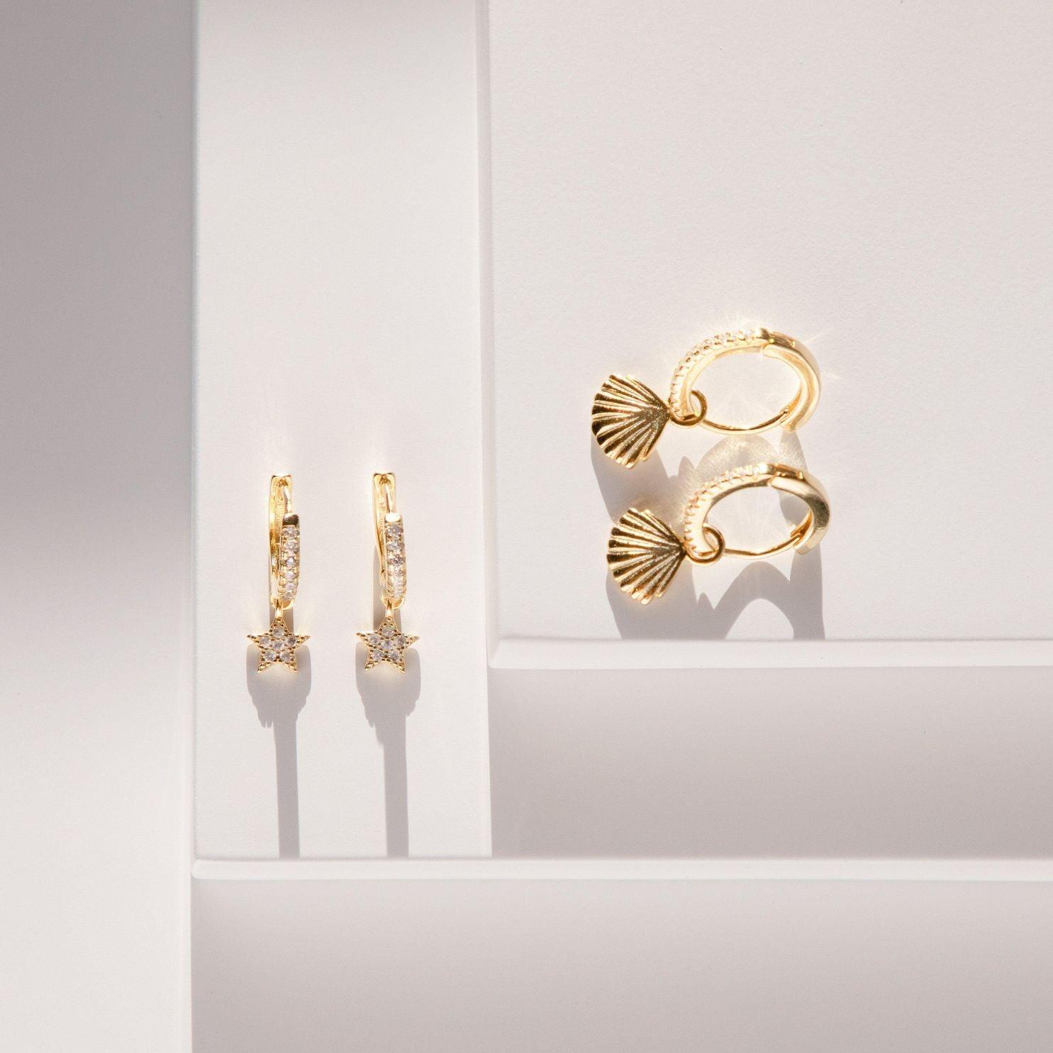 Celestial pair of gold star huggie hoop earrings - Helix & Conch