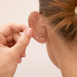Elena 9k solid yellow gold graduating crystal trio flat back stud earring