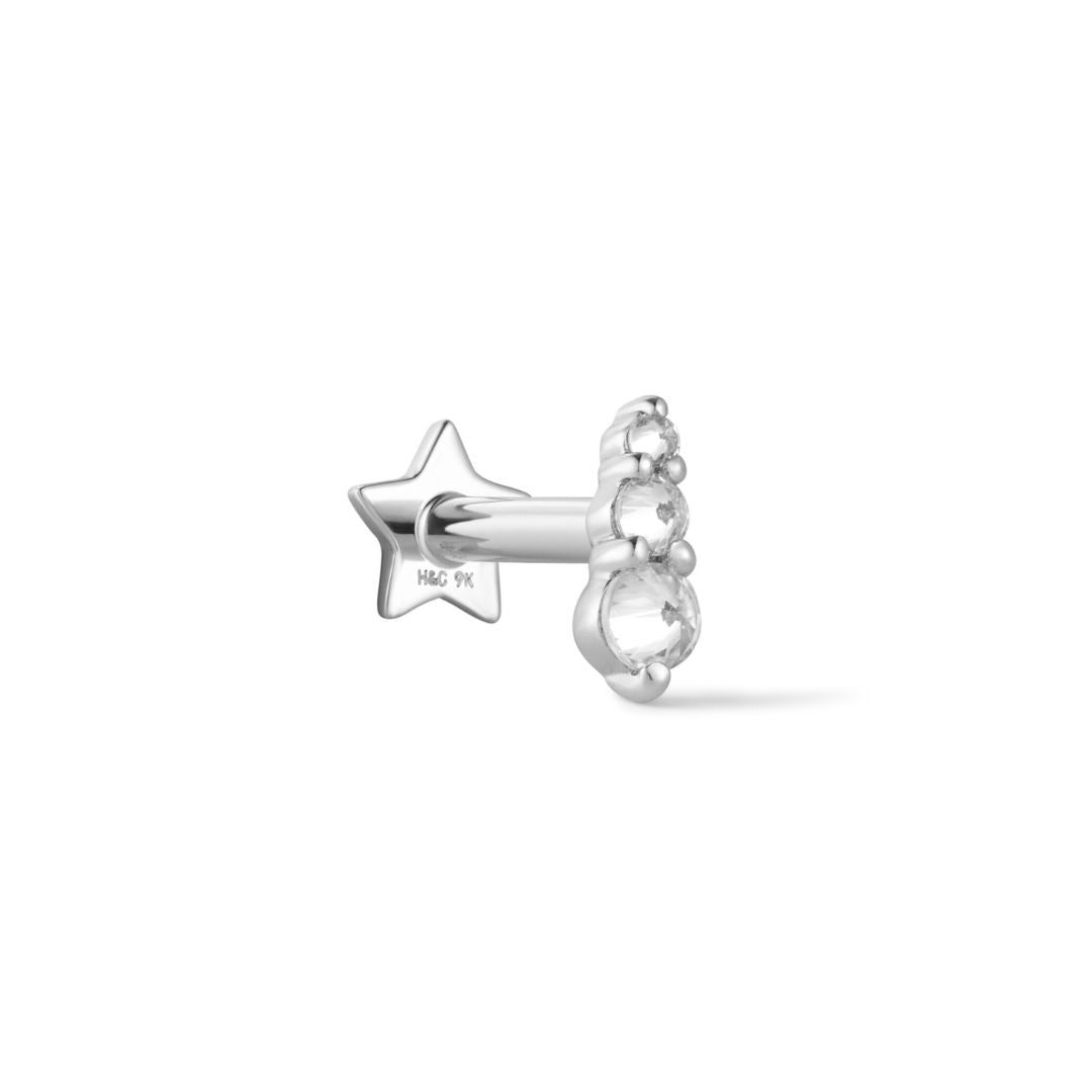 A 9k solid white gold flat back reversible stud earring with a celestial design, featuring a beaded prong set with brilliant-cut cubic zirconias