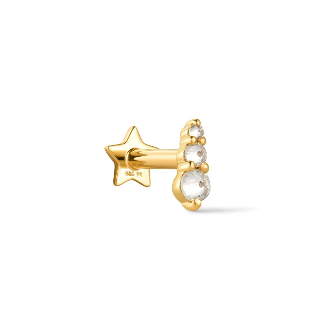 A 9k solid yellow gold flat back reversible stud earring with a celestial design, featuring a beaded prong set with brilliant-cut cubic zirconias