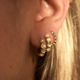 Perla medium gold beaded huggie hoop earring
