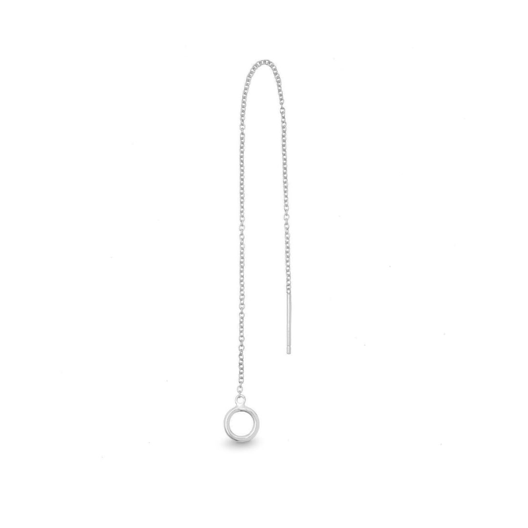 A single 14k white gold plated threader earring with a small circular charm, hanging from a white gold chain.