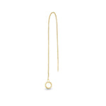 A single yellow gold threader earring with a small circular charm, hanging from a gold-plated chain.