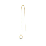 A single yellow gold threader earring with a small circular charm, hanging from a gold-plated chain.