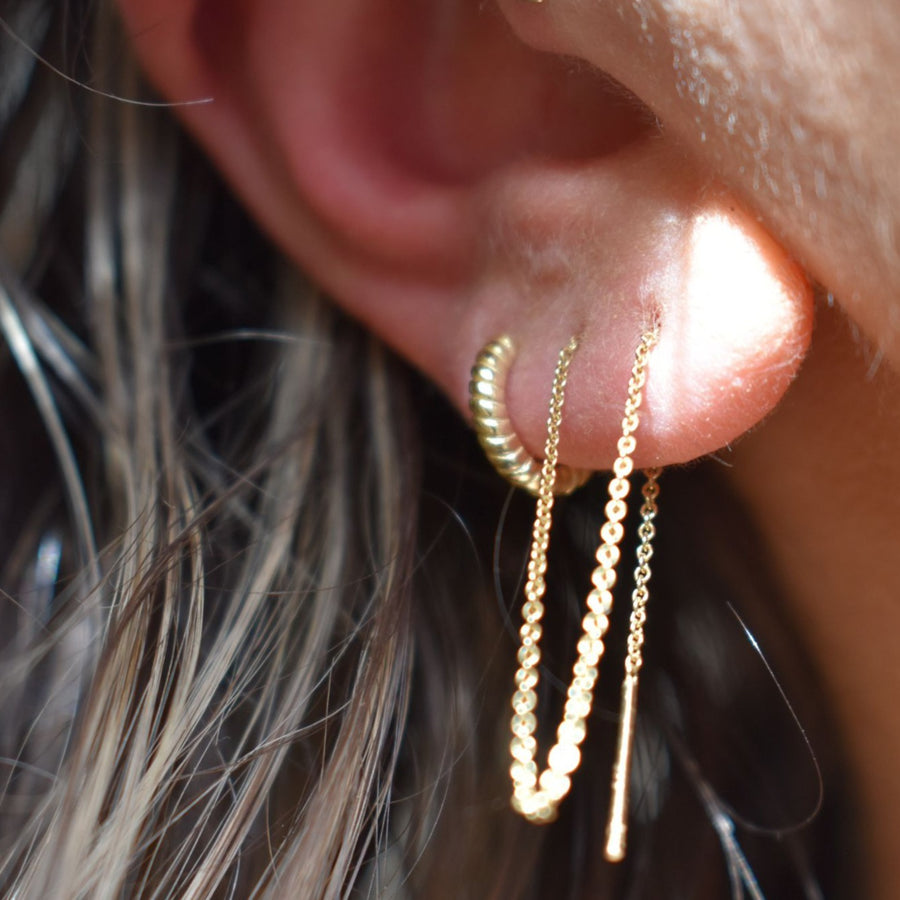 Hilo yellow gold single threader earring