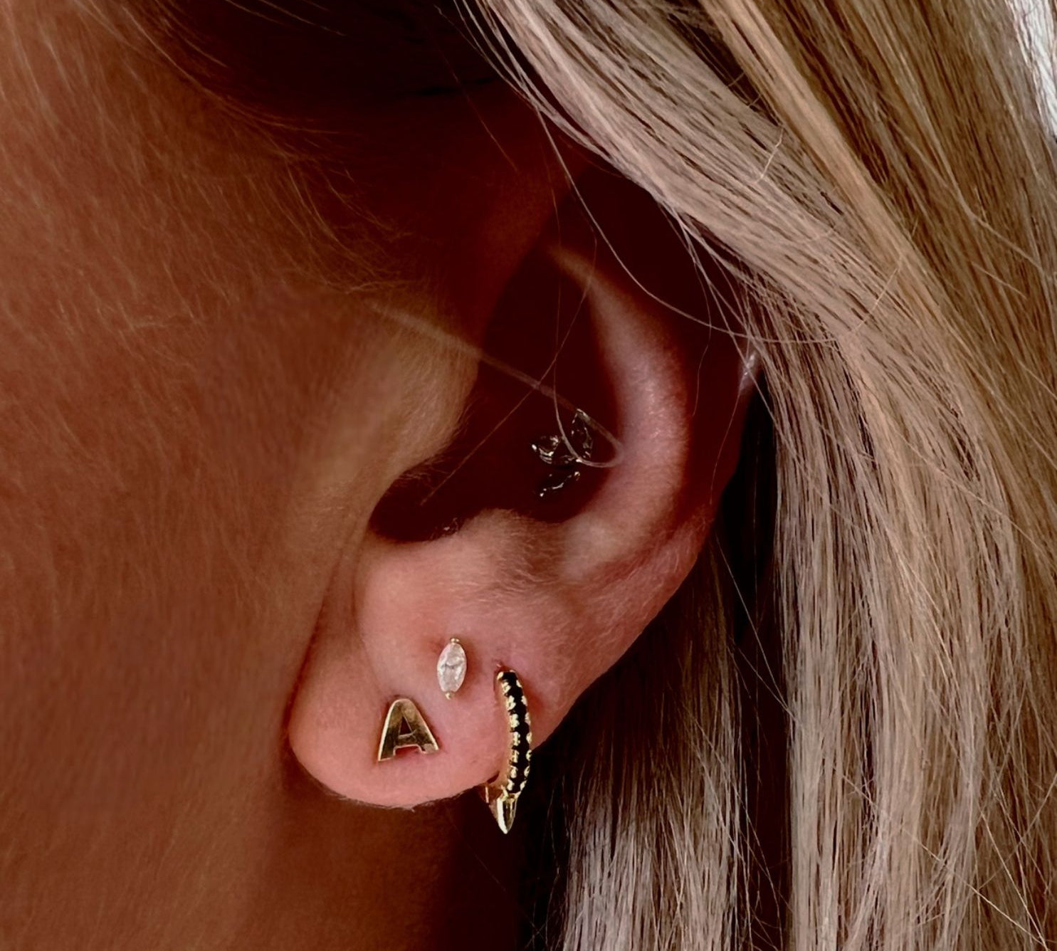 Noir gold and black stone spike huggie hoop earring - Helix & Conch