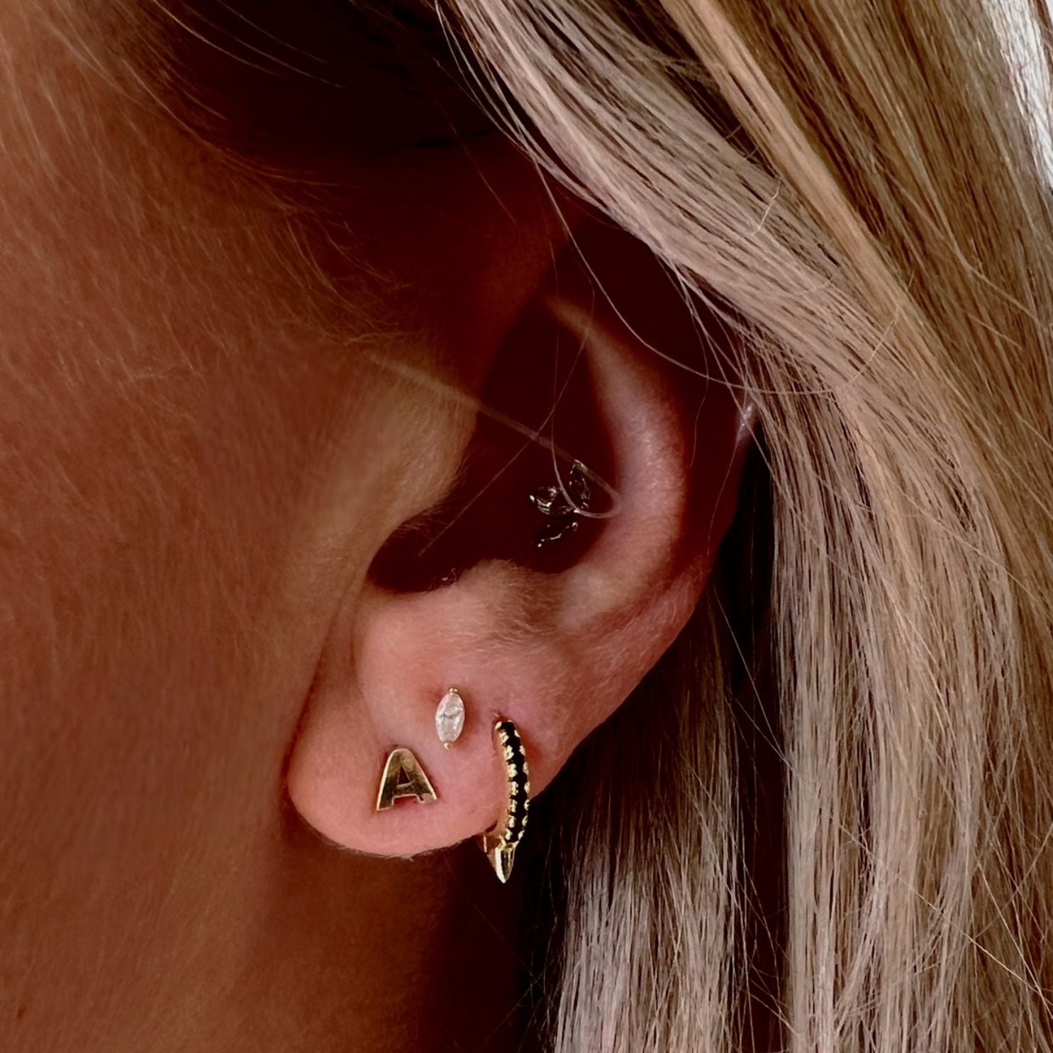 Noir gold and black stone spike huggie hoop earring - Helix & Conch