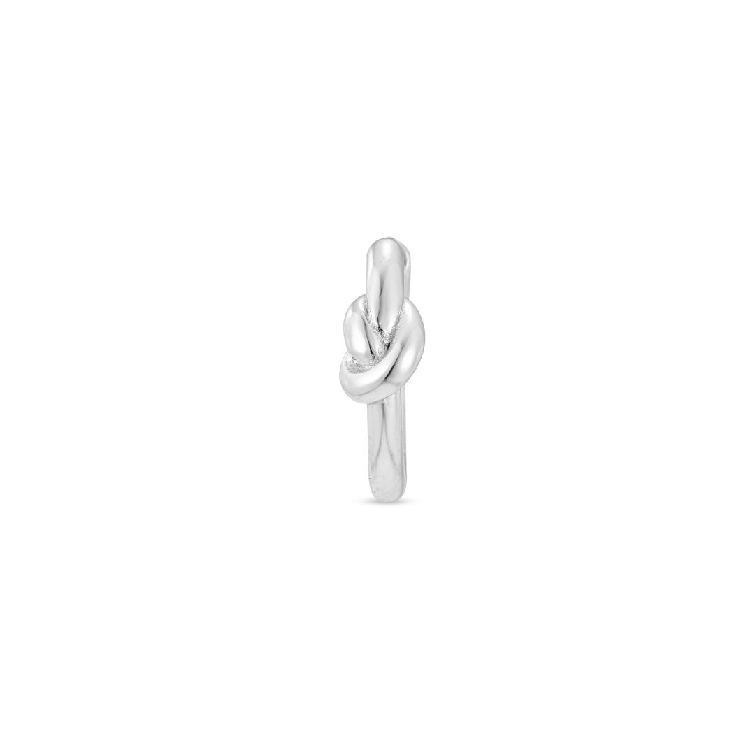 Silver knot-shaped hoop earring on a white background