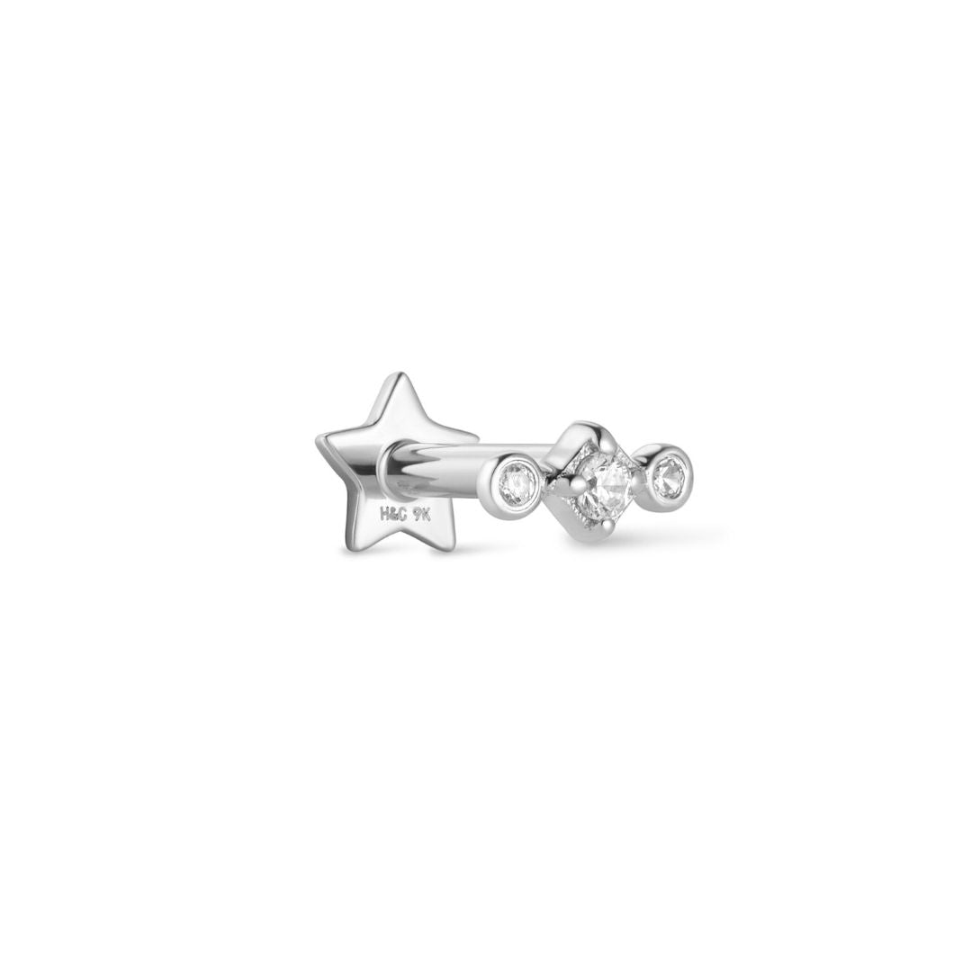 A single 9k solid white gold linear stud earring with three cubic zirconia flat backs, designed to be worn on the ear.