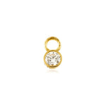 Gold earring charm with a clear gemstone on a white background