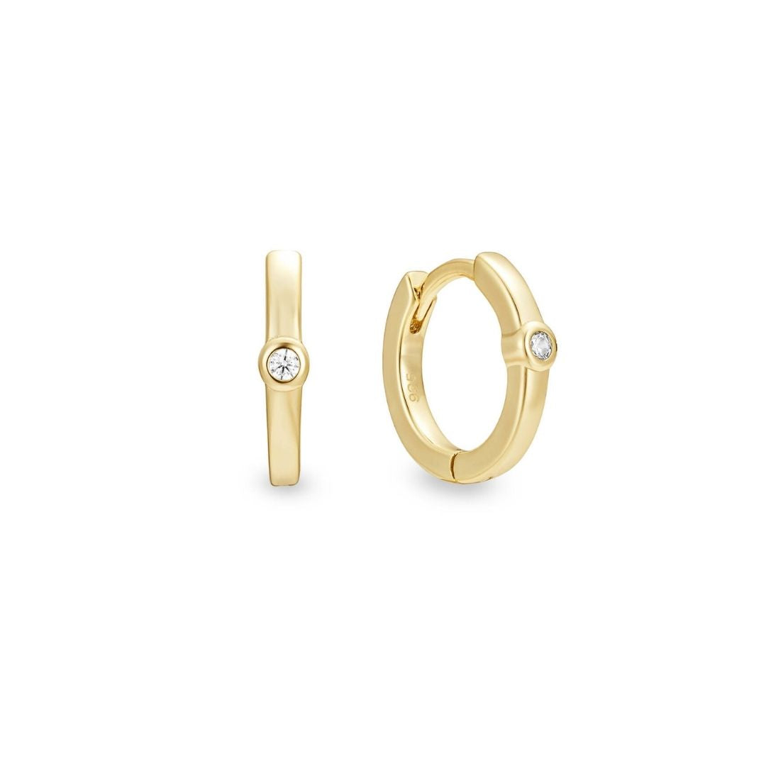 Solus yellow gold single huggie earring with tiny solitaire stone ...