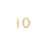 Solus yellow gold single huggie earring with tiny solitaire stone