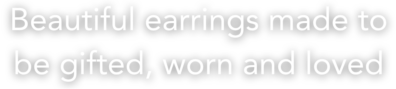 Text on a white background with a message about earrings.