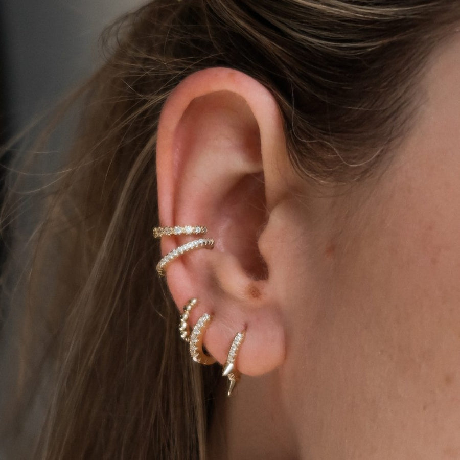 Picchi pair of gold spike huggie hoop earrings