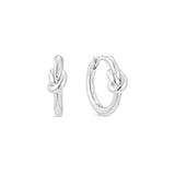 Silver knot-shaped hoop earrings on a white background