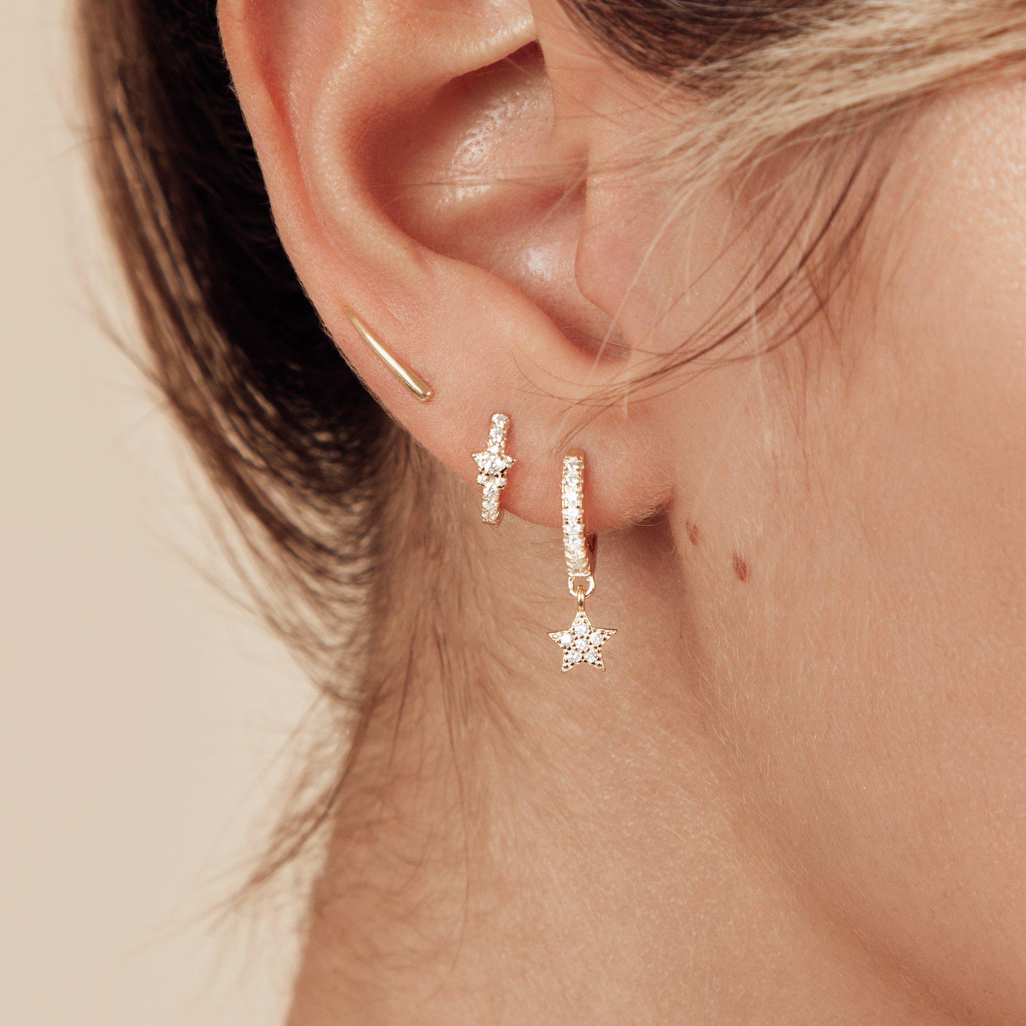 Celestial pair of gold star huggie hoop earrings - Helix & Conch