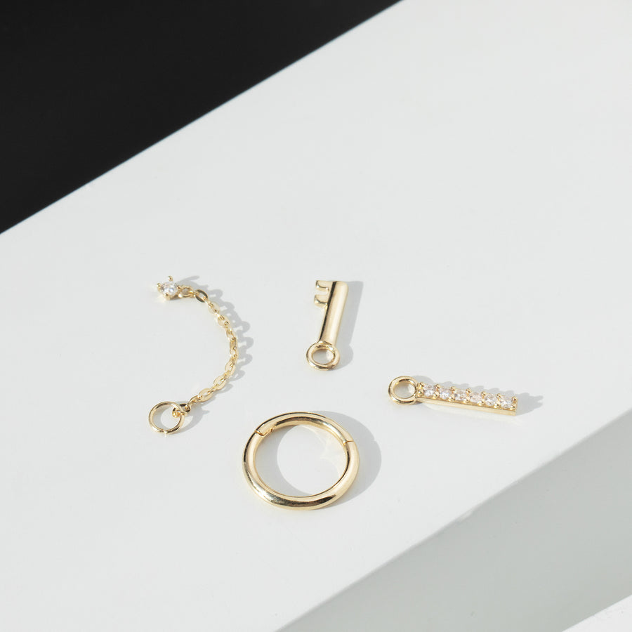Clef single 9k solid yellow gold key charm